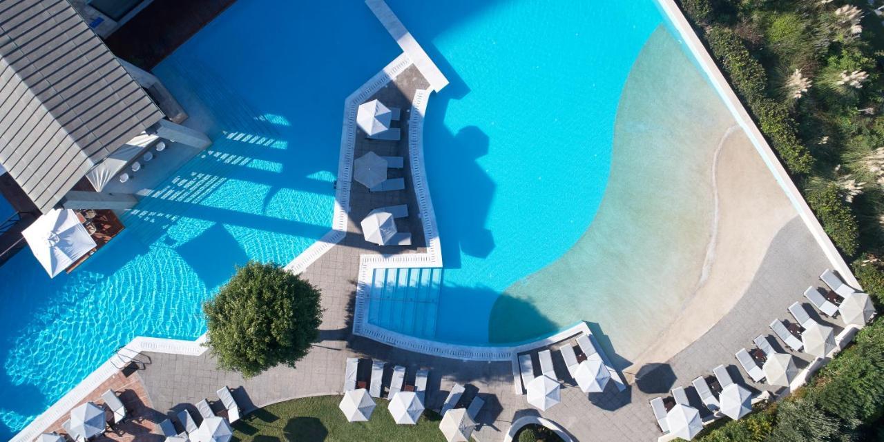 Amus Hotel & Spa Ixia (Rhodes) Exterior foto Aerial view of the pool at the Hotel