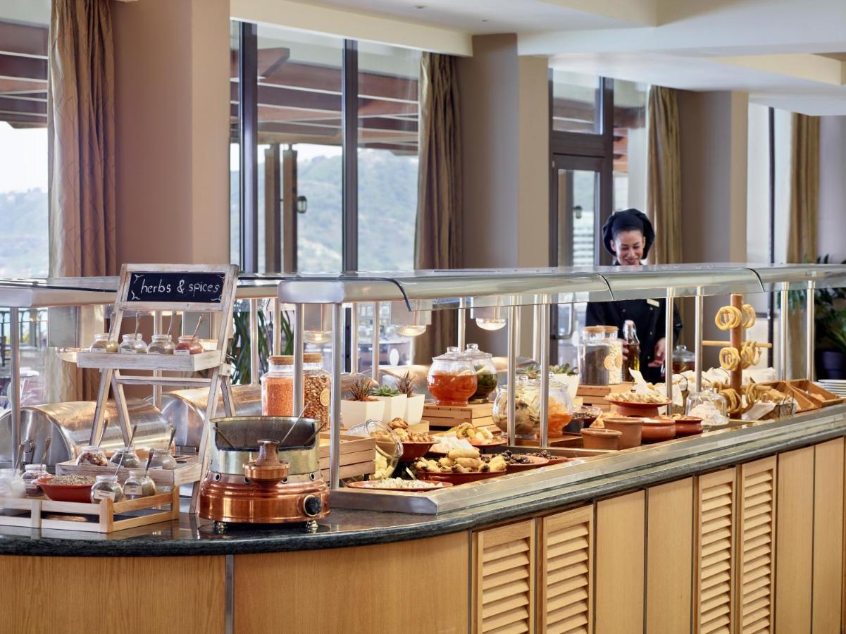 Amus Hotel & Spa Ixia (Rhodes) Exterior foto A buffet at a hotel